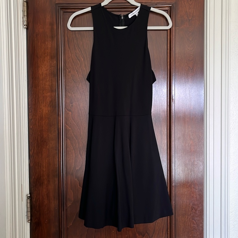cupcakes and cashmere black fit and flare cocktail dress. Medium